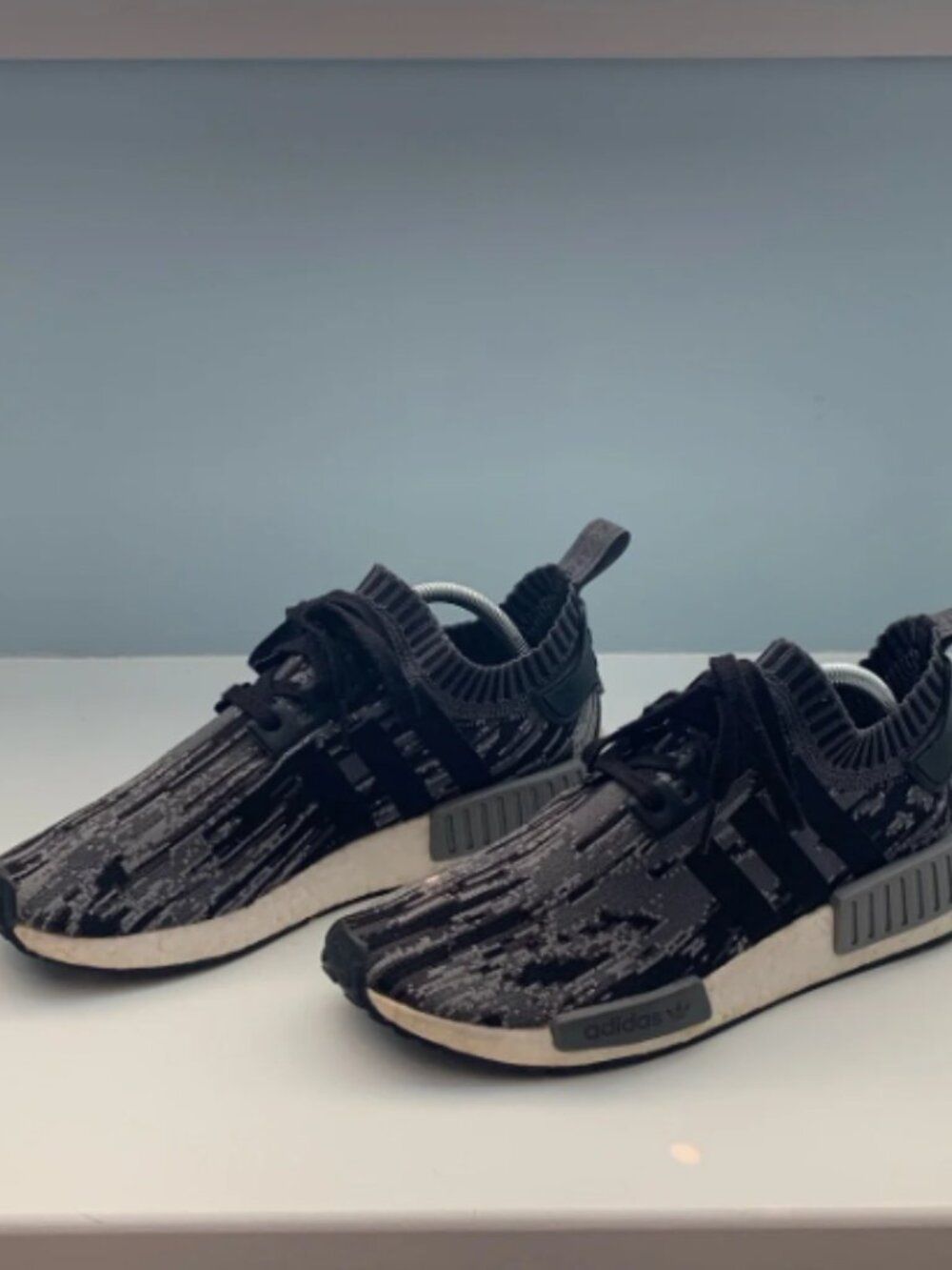 adidas Black and Gray primeknit NMD’s Patterned Slip-On Sneakers